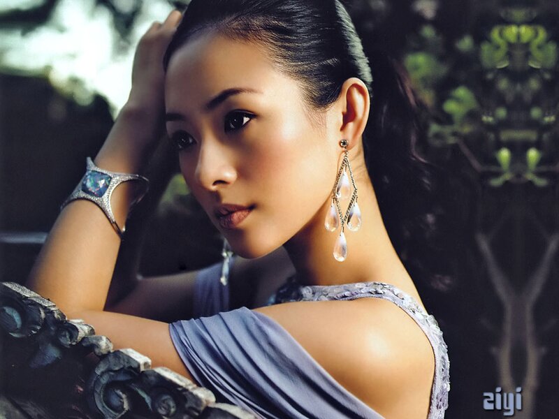 woman in blue dress with jewelry