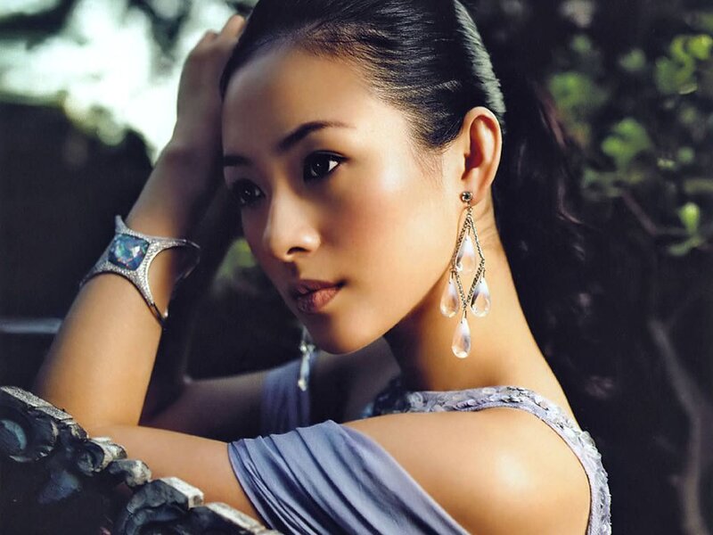 woman in blue dress with jewelry