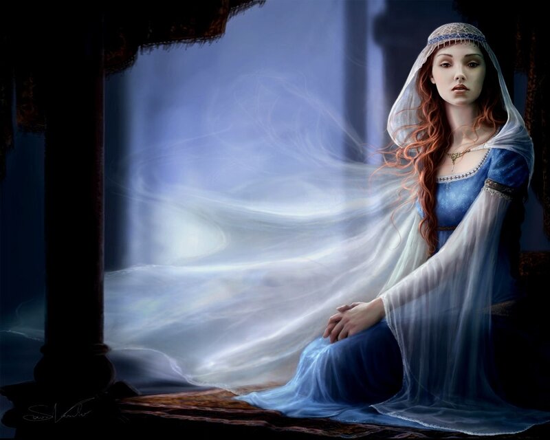 woman in blue dress with veil