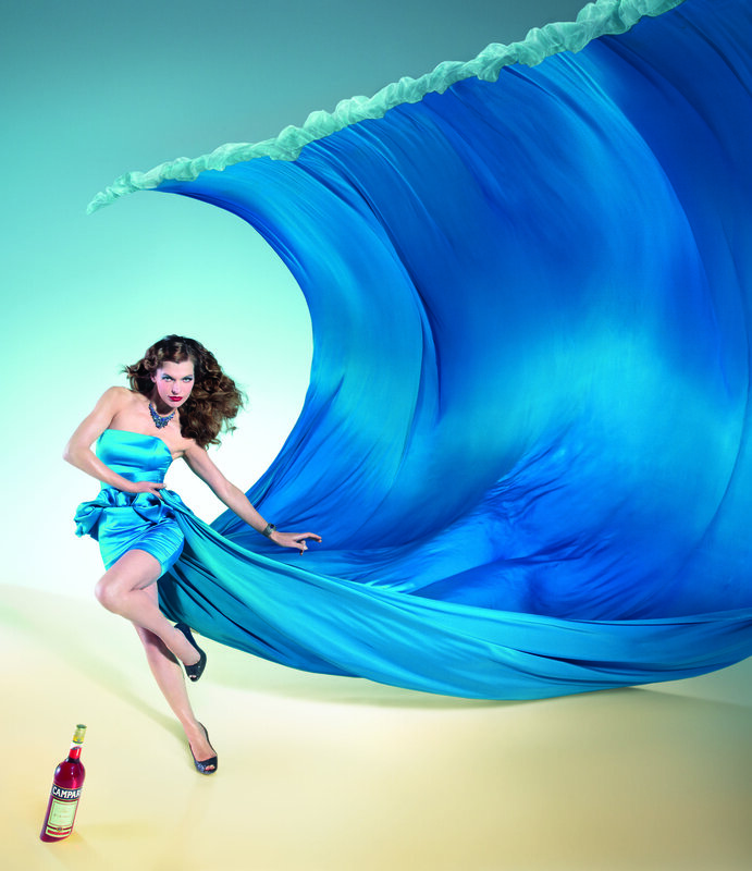Woman in blue dress with wave