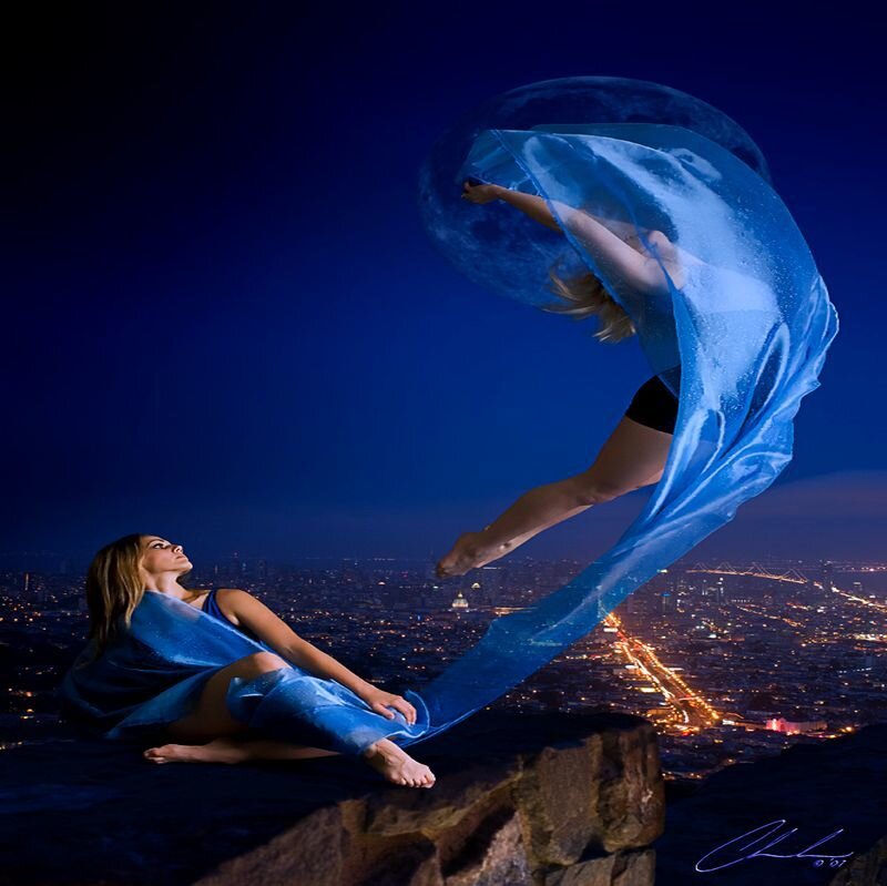 Woman in Blue Fabric — Dramatic