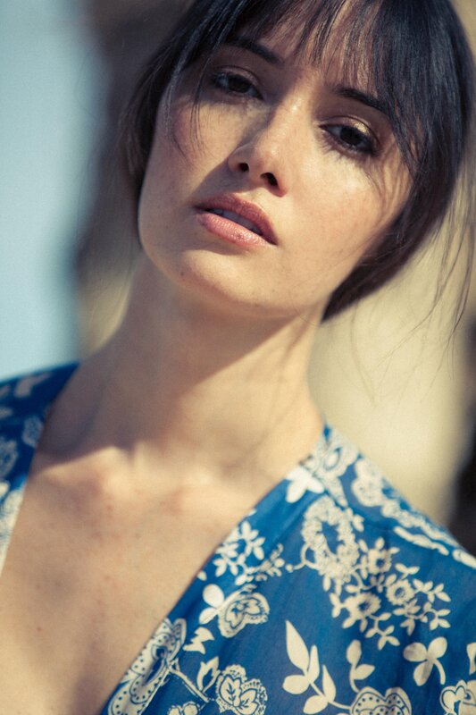 woman in blue floral dress