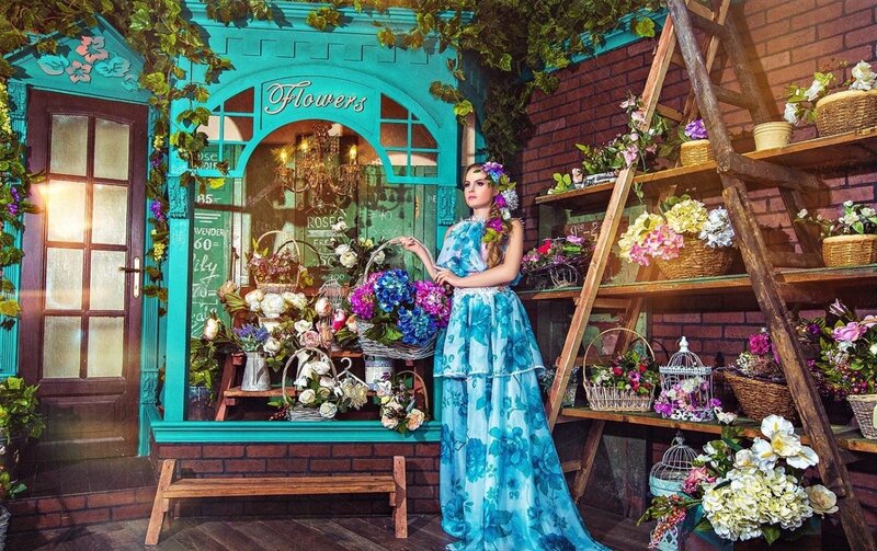 Woman in Blue Floral Dress — Dramatic