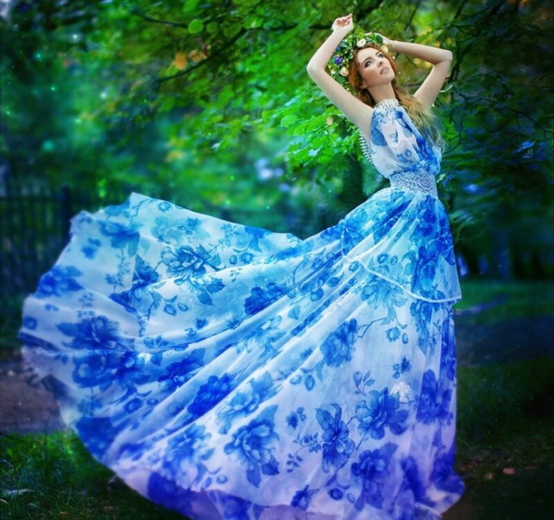 Woman in Blue Floral Dress — Serene