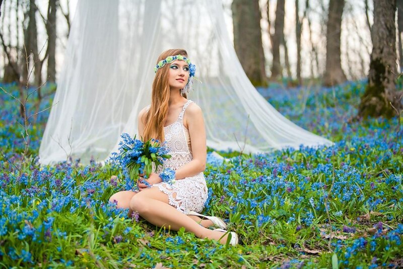 Woman in Blue Flower Field