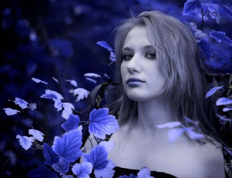 Woman in Blue Foliage