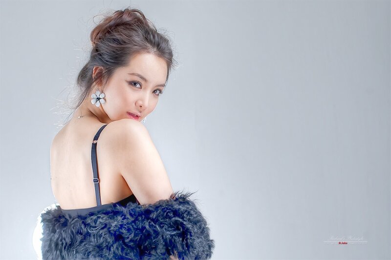 Woman in Blue Fur Coat — Stylish