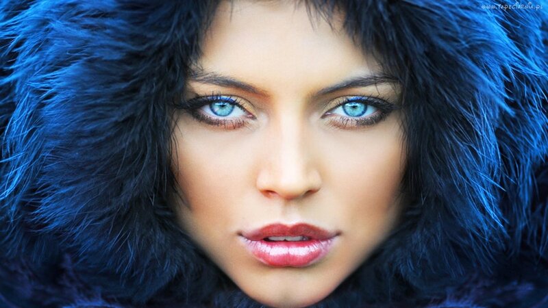 woman in blue fur hood