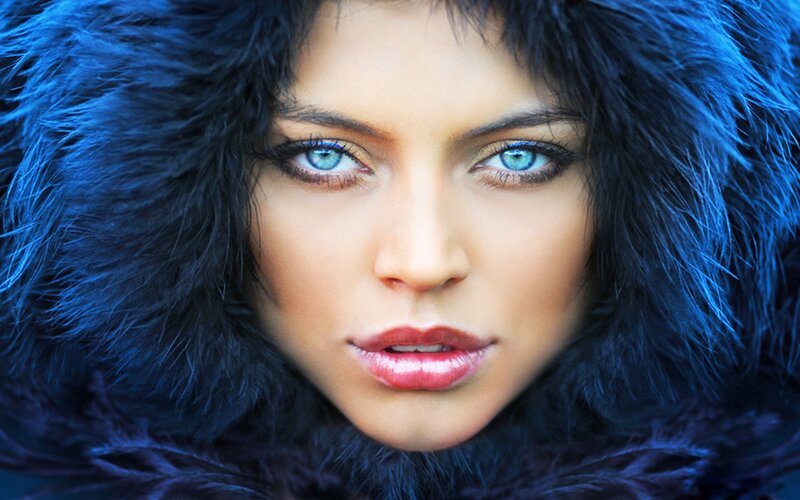 woman in blue fur hood
