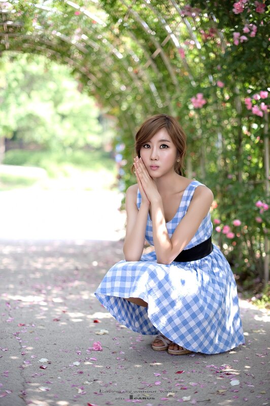 woman in blue gingham dress