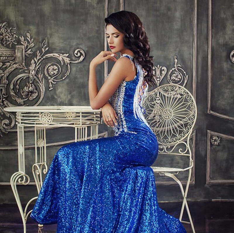 Woman in Blue Gown — Dramatic, Photograph, Chair
