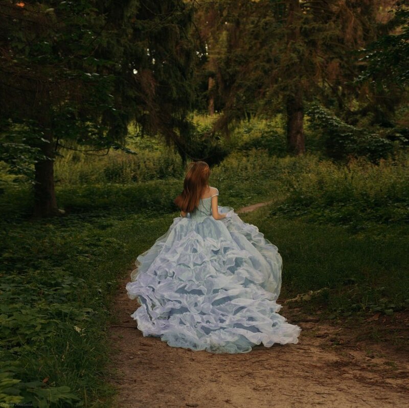 Woman in Blue Gown — Serene, Sunset, Photograph