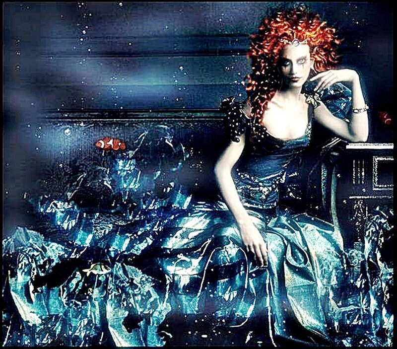 woman in blue gown underwater