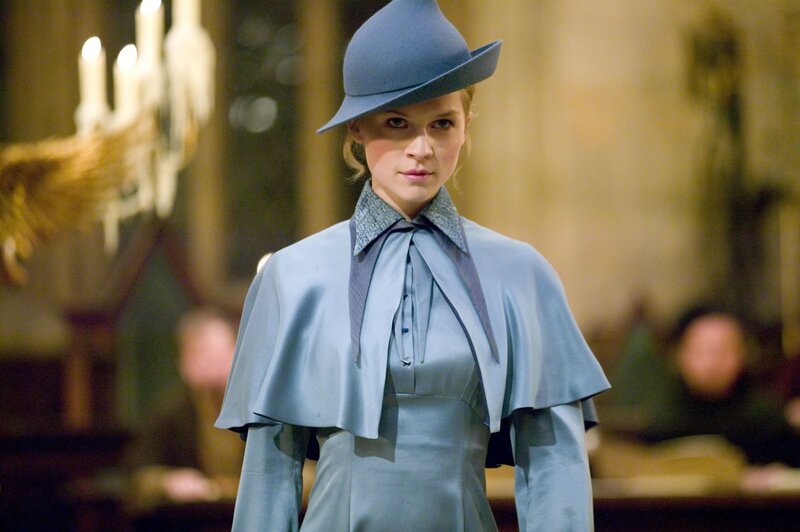 woman in blue hat and coat