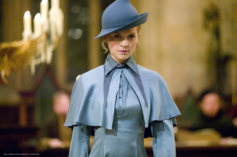 woman in blue hat and coat