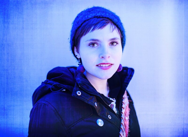 woman in blue hat and jacket