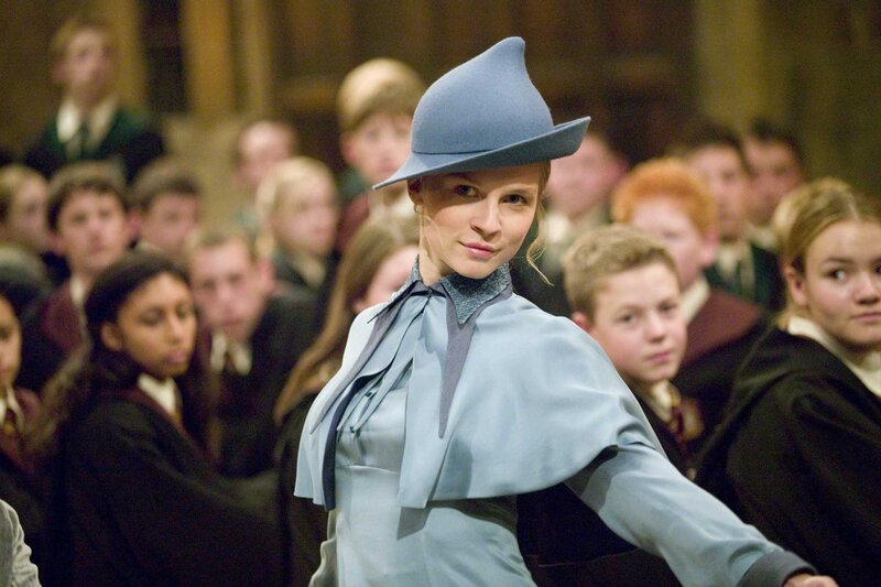 woman in blue hat at event
