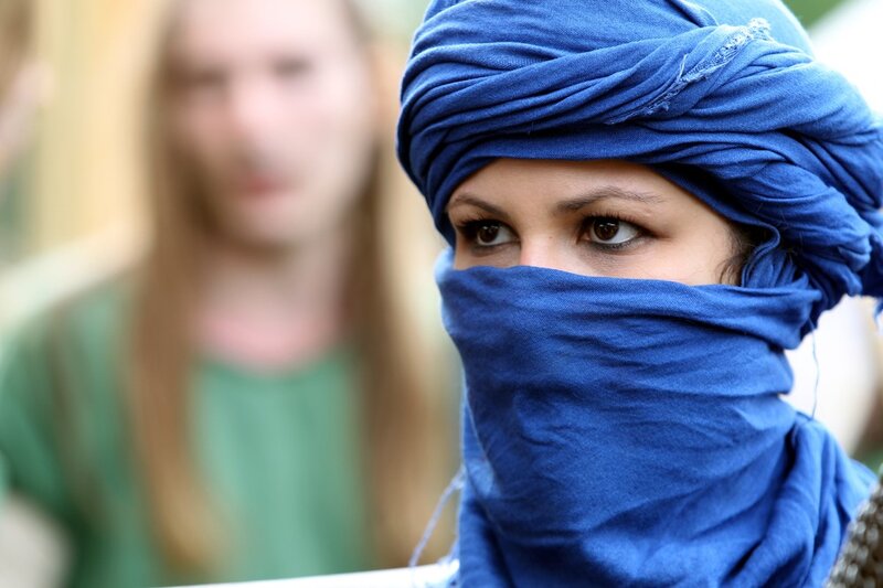 woman in blue headscarf