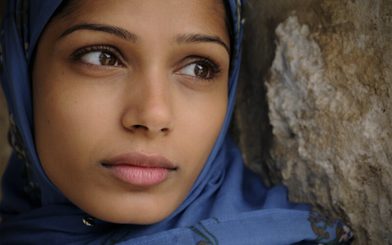 Woman in Blue Hijab — Serious