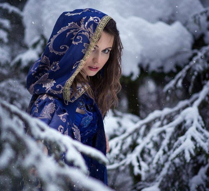 Woman in Blue Hooded Cloak — Dramatic, Winter