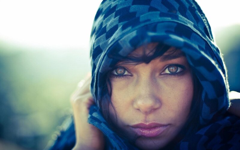 woman in blue hooded scarf