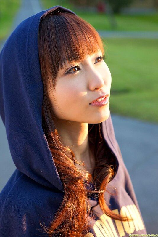 woman in blue hoodie outdoors
