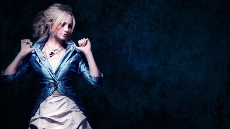 woman in blue jacket