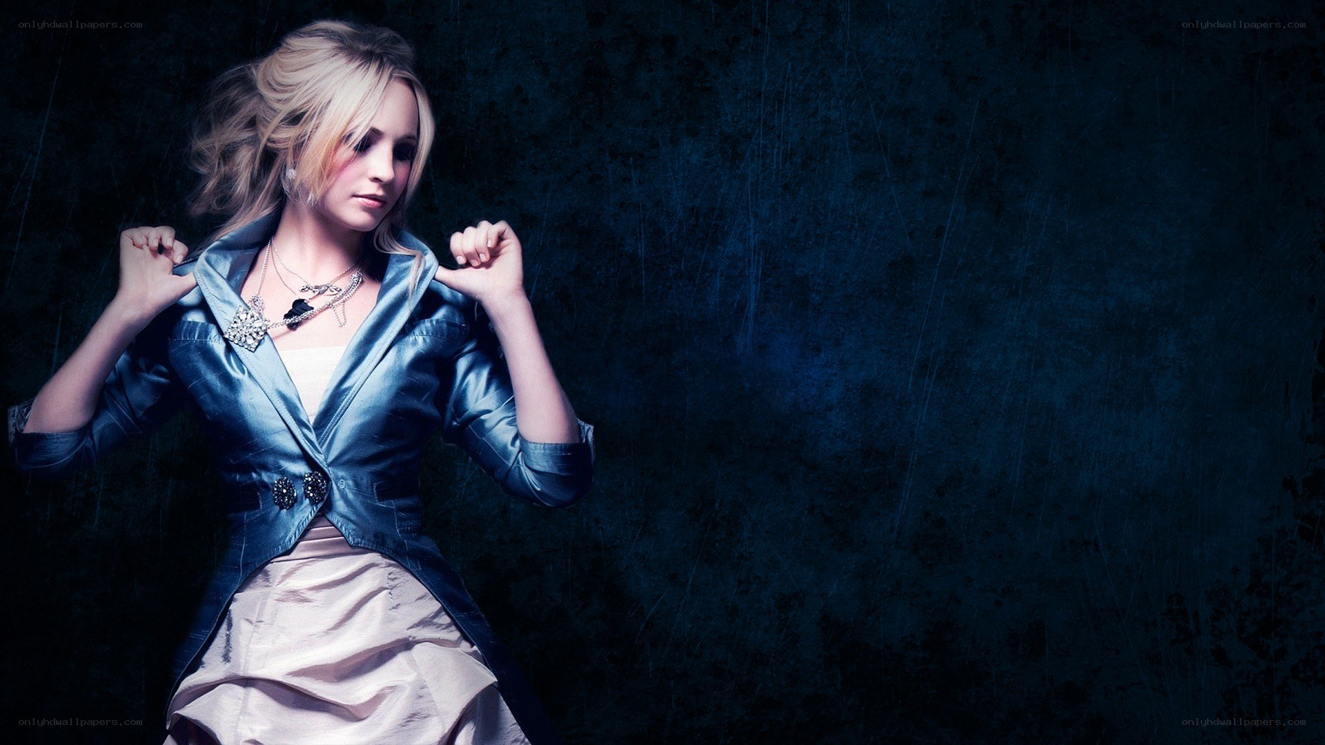 woman in blue jacket