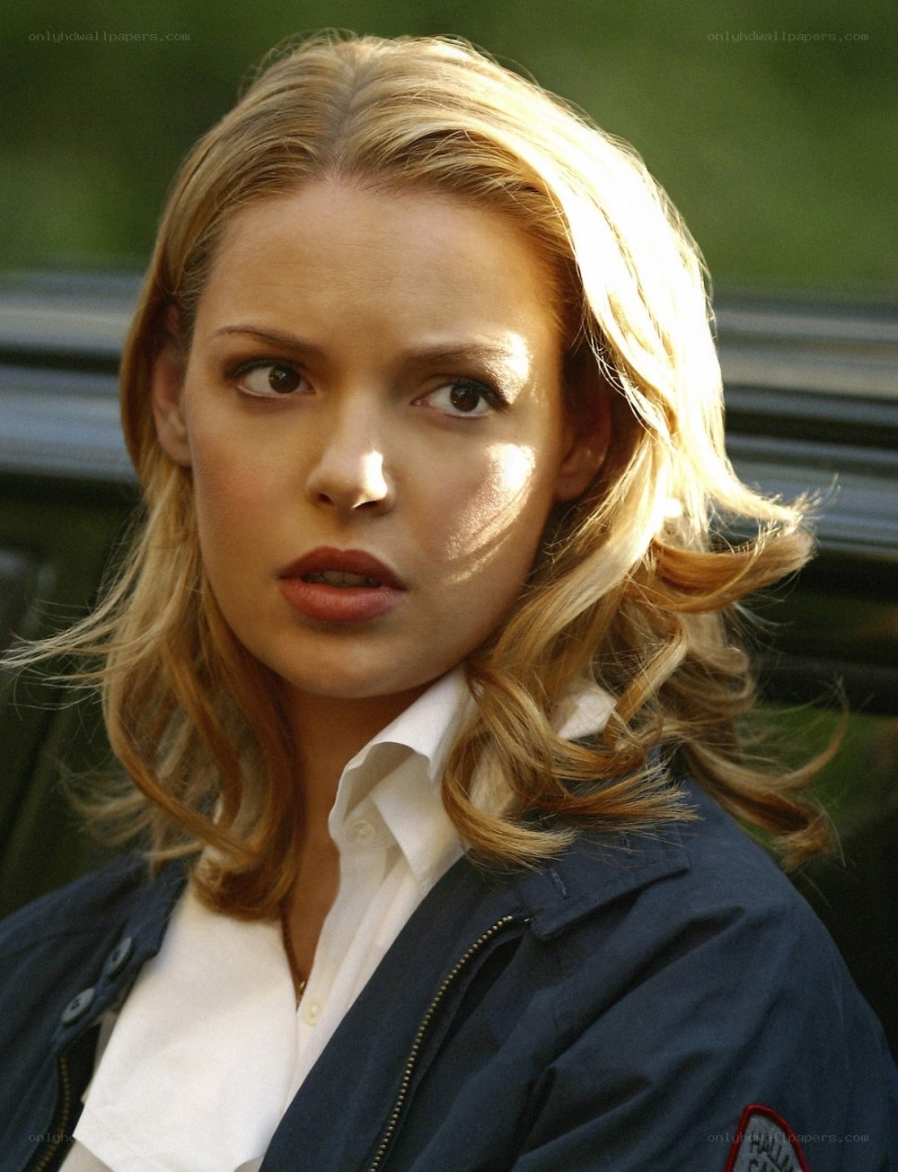 woman in blue jacket
