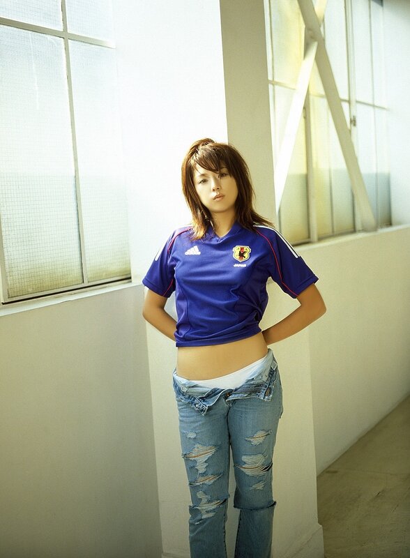 woman in blue jersey and jeans