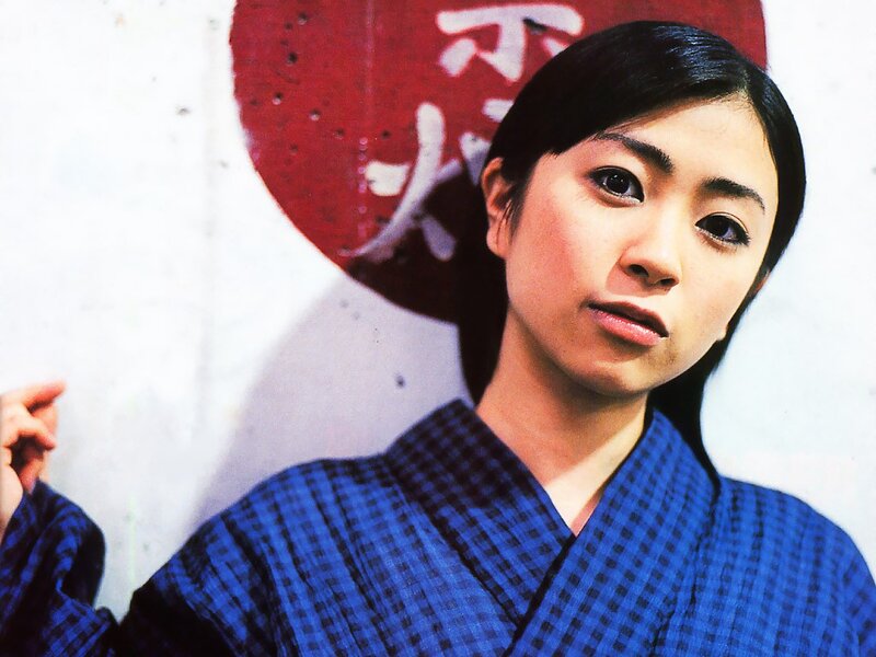 woman in blue kimono