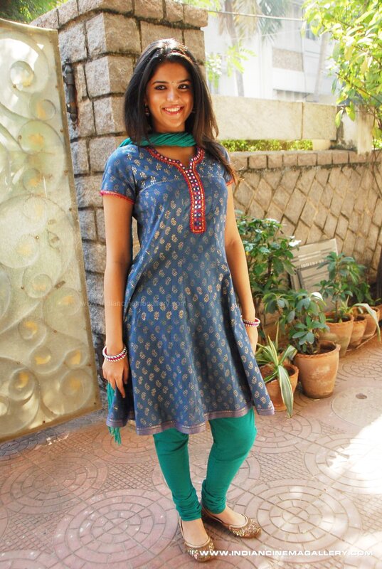 woman in blue kurta and green leggings