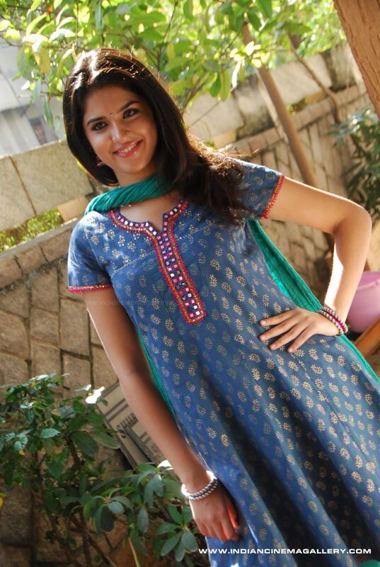 woman in blue kurta smiling