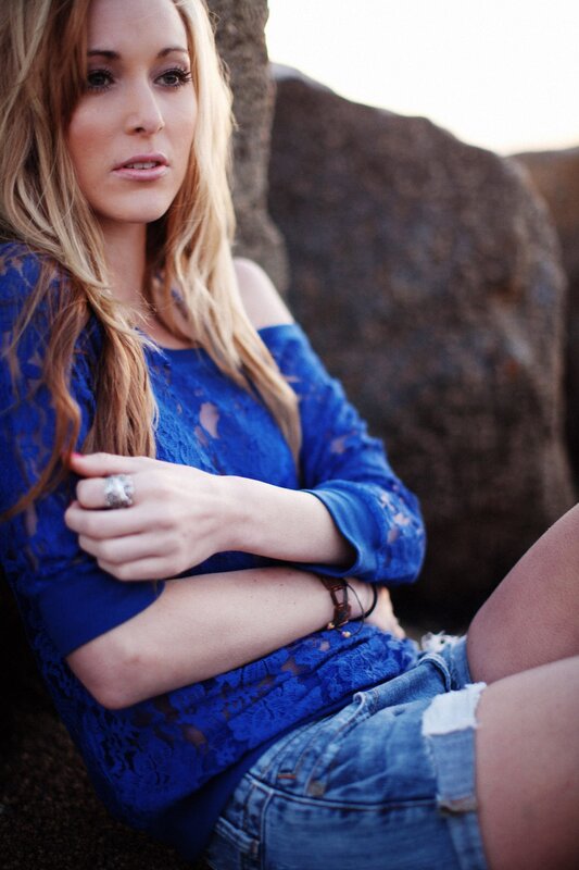 woman in blue lace top