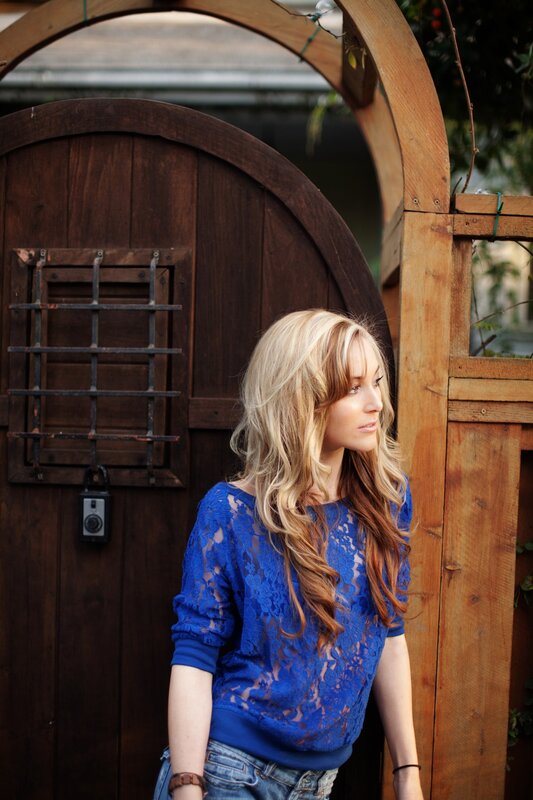 woman in blue lace top