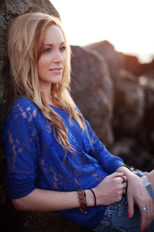 woman in blue lace top