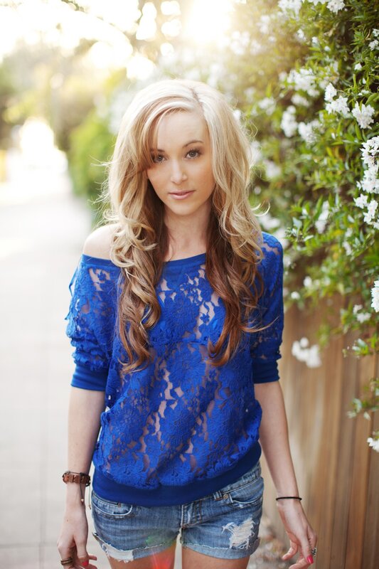 woman in blue lace top