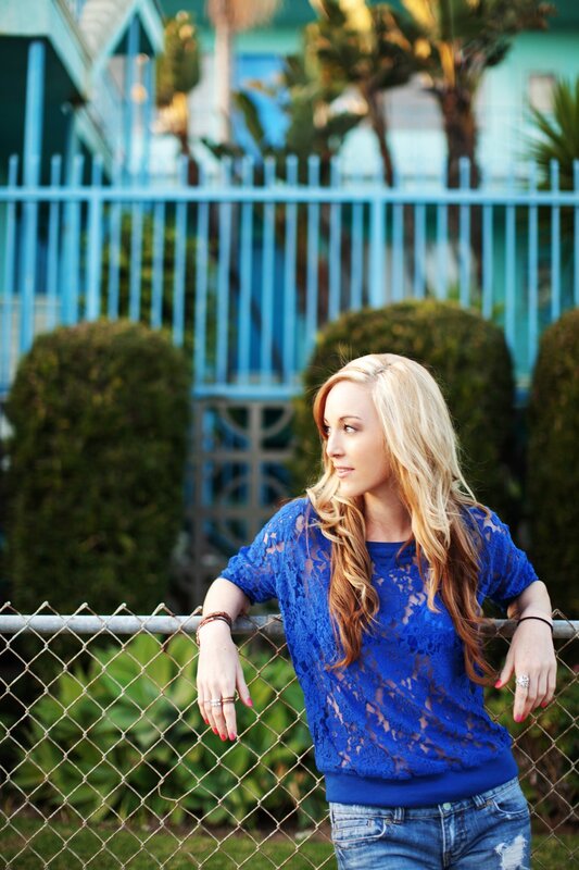 woman in blue lace top
