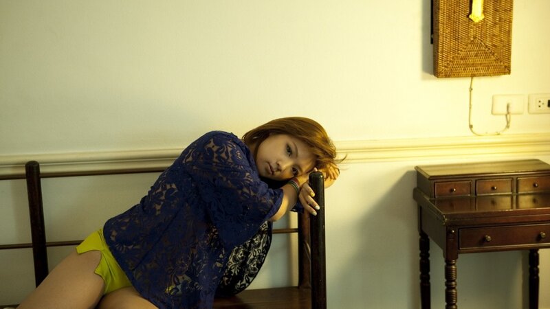 woman in blue lace top