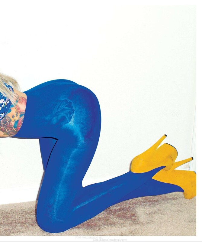 woman in blue leggings and yellow heels
