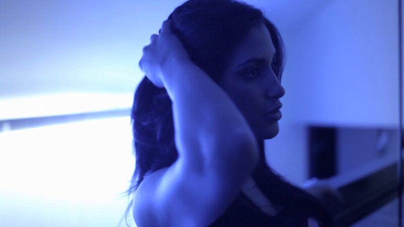 woman in blue light