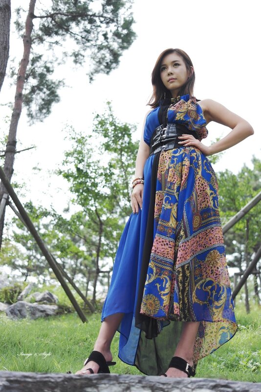 Woman in blue patterned dress