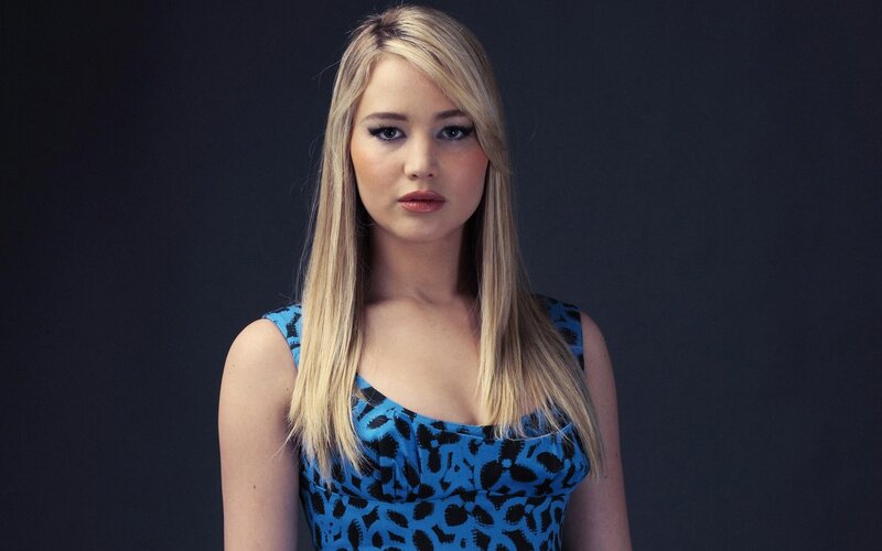 woman in blue patterned dress