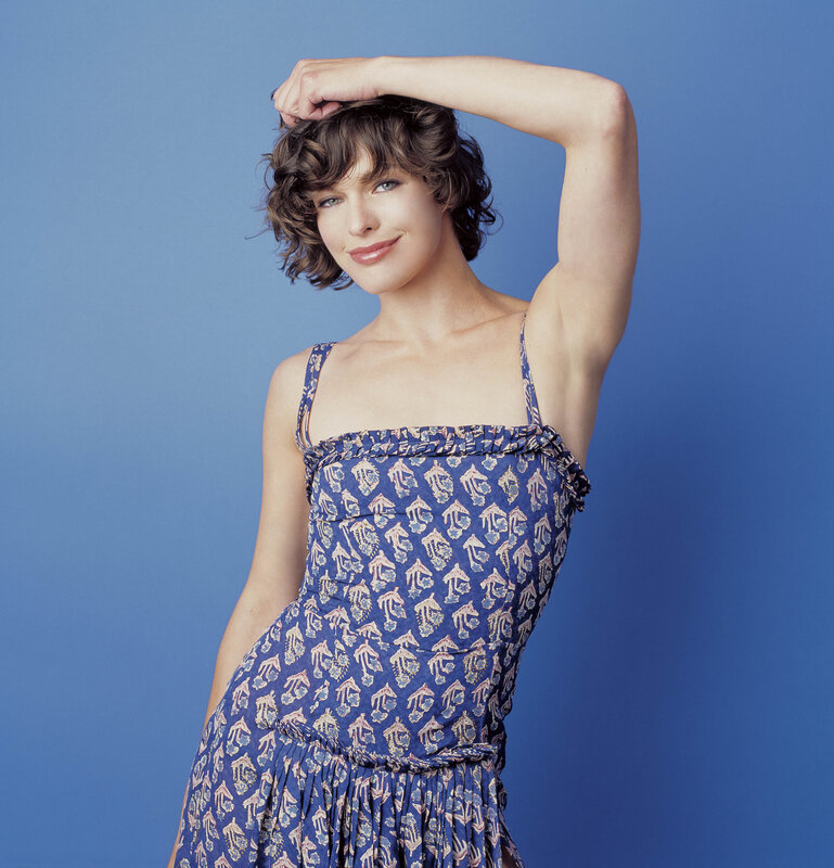 woman in blue patterned dress