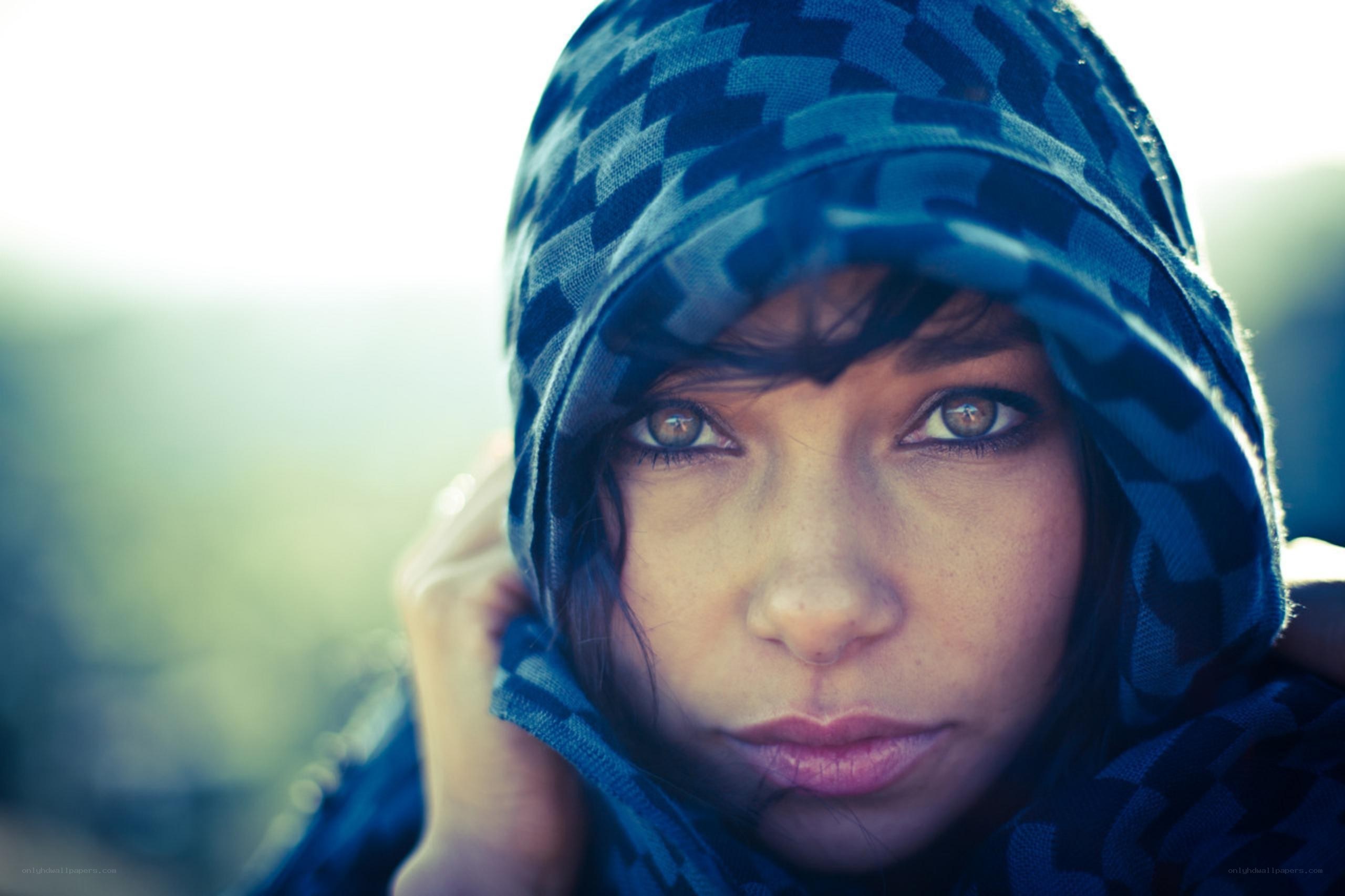 woman in blue patterned hood
