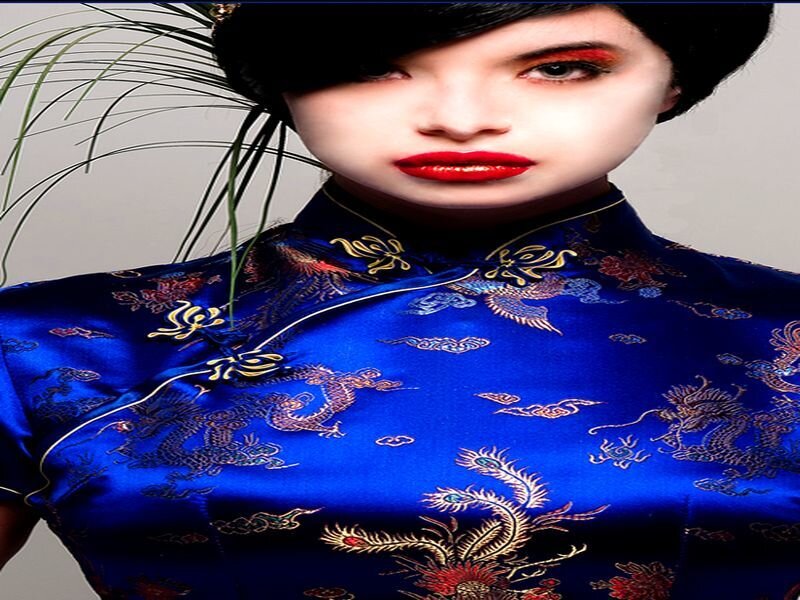 Woman in Blue Qipao