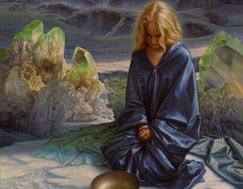 Woman in blue robe kneeling