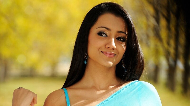woman in blue sari outdoors