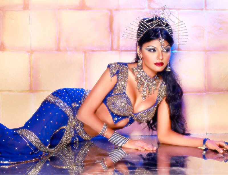 woman in blue sari posing