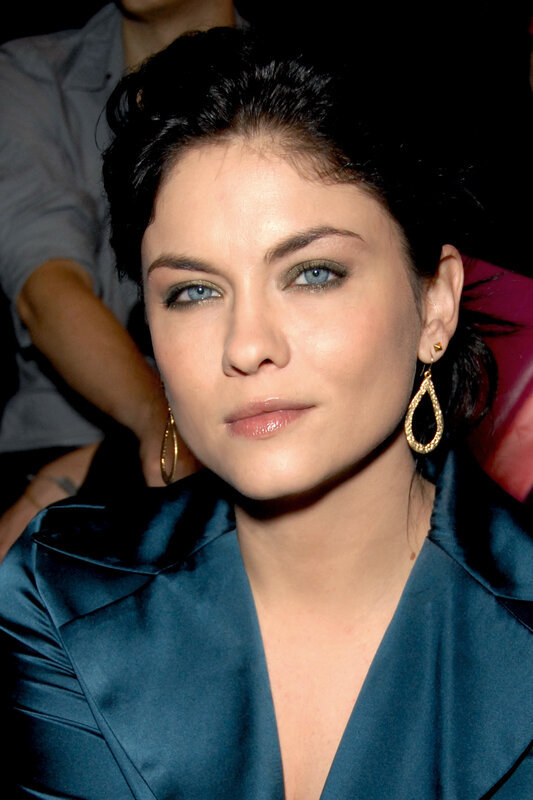 woman in blue satin jacket